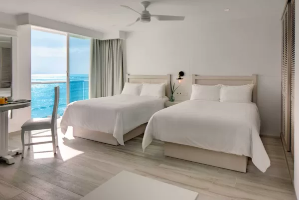 Habitación "Superior Ocean View" con vista al mar del Hotel Boutique Óleo Cancún Playa, hotel todo incluido en Cancún